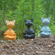 Three ceramic buddha cat figurines in orange black and light blue robes for living room decorbites black buddha decor