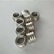 Shiny metallic threaded insert rings for e40 lamp holder adapter pack used in garage workshop lighting