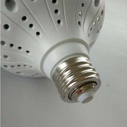 White led bulb with textured perforated design and metallic screw base for e40 lamp holder garage workshop lighting