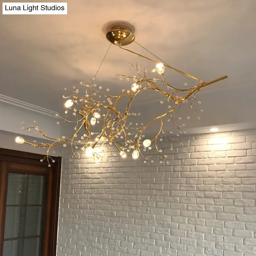 Golden situla metallic branch chandelier with clear crystal bead droplets and warm glowing bulbs for romantic lighting