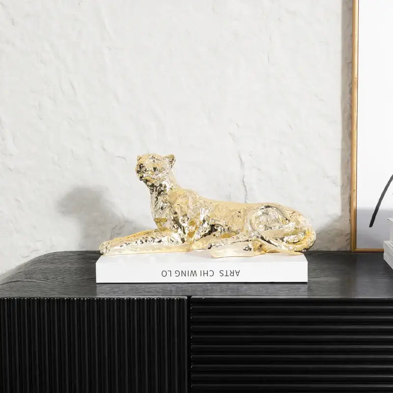Metallic gold decorbites leopard resin sculpture with glossy finish and detailed fur texture for living room decor