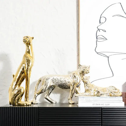 Metallic gold and silver leopard resin sculpture with textured reflective surfaces for living room decorbites leopard resin decor