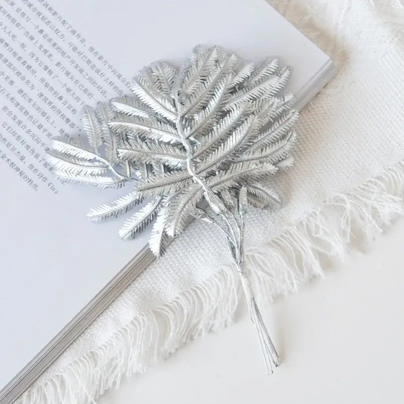 Silver metallic fern-shaped decorative pin from decorbites gold palm leaves living room palm leaves decor