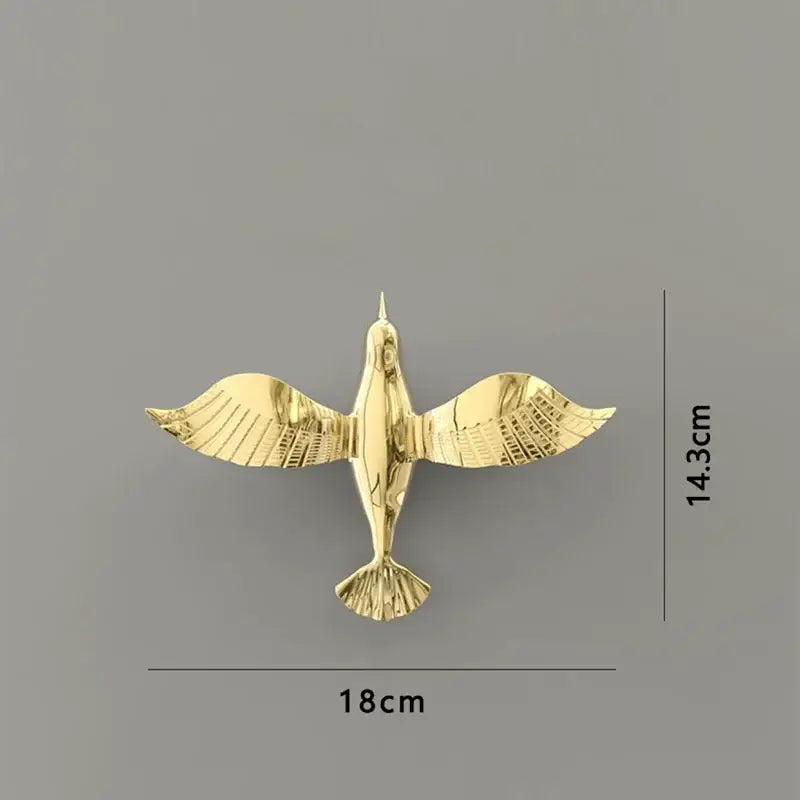 Golden metal dove statue with detailed feather patterns and sleek design for living room pigeon wall decor