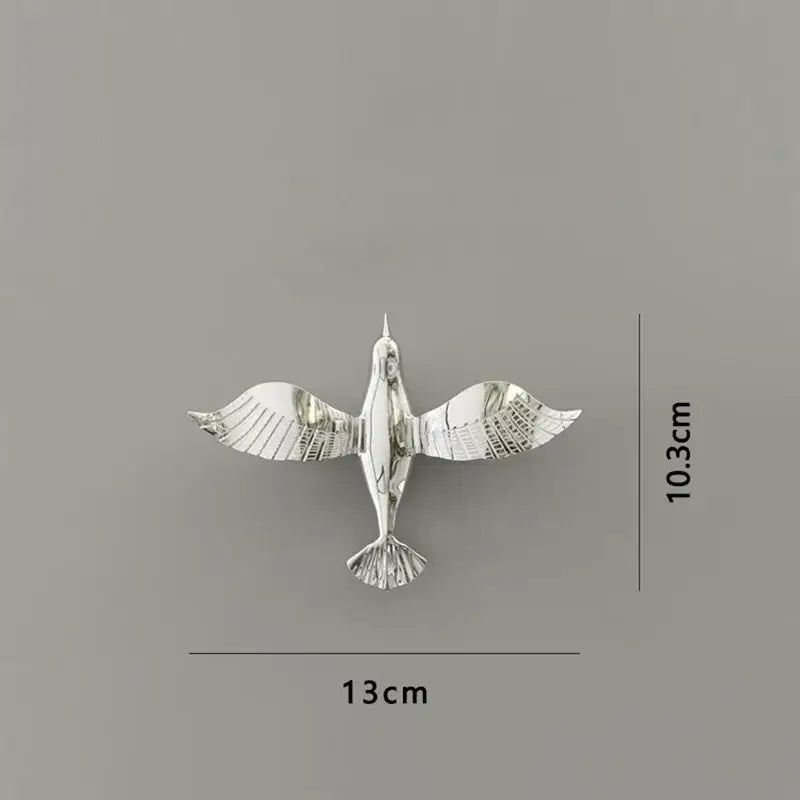 Silver metal dove statue featuring detailed wing and tail feathers, a 13cm wide pigeon wall decor for living room