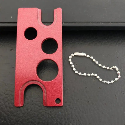 Red aluminum essential oils opener card holder with three circular cutouts and keychain loop by decorbites essential oils