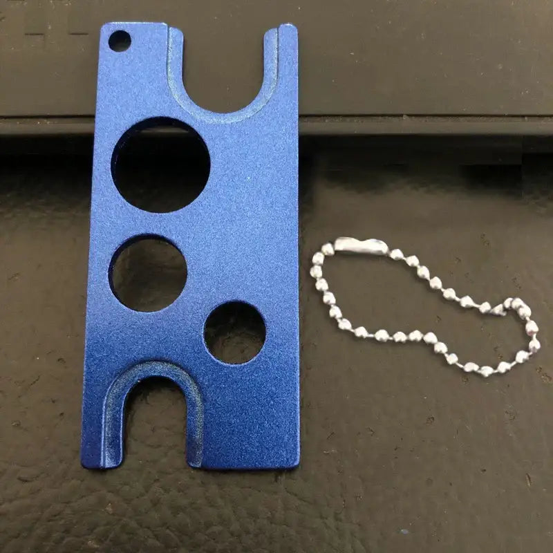 Blue aluminum metallic multi color essential oils opener tool with circular slots and ball chain for decorbites essential oils storage