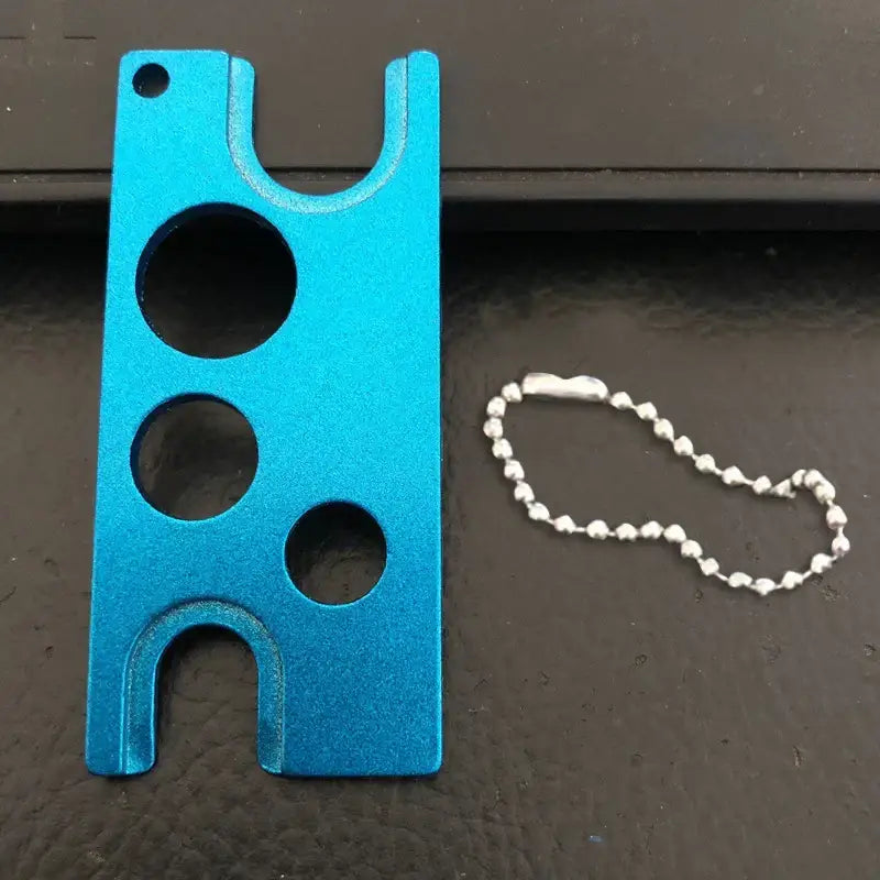 Bright blue aluminum essential oils opener card holder with three circular cutouts and matching ball chain by decorbites essential oils