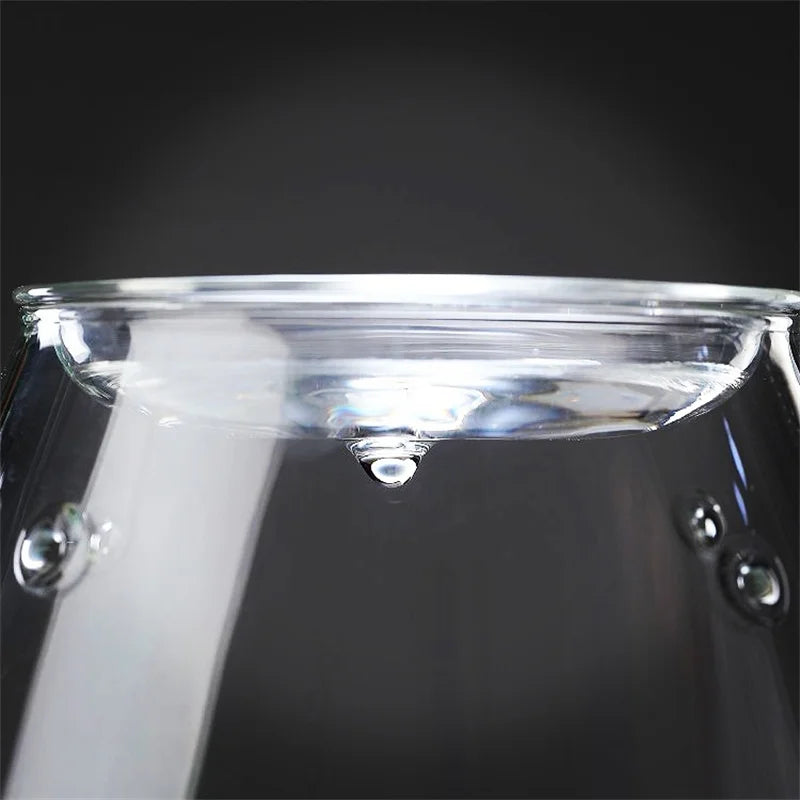 Clear glass tumbler with smooth rounded rim featuring subtle reflective highlights for bonsai home decor use