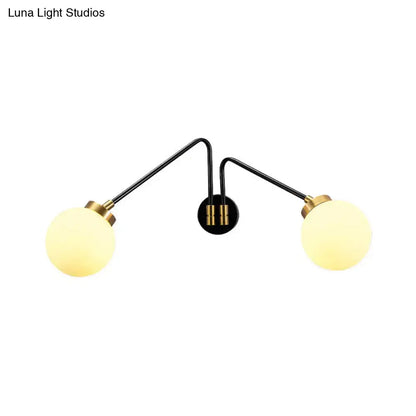 Mid century black and brass double-arm wall sconce with frosted opal glass globe shades for e26 e27 bulbs in bedroom