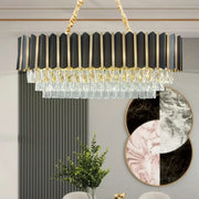 Mid century black and gold rectangular light fixture with cascading clear crystal droplets and braided golden cord
