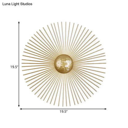 Mid century brass sunburst sconce light with gold toned metal fixture type features radiating spokes and central orb