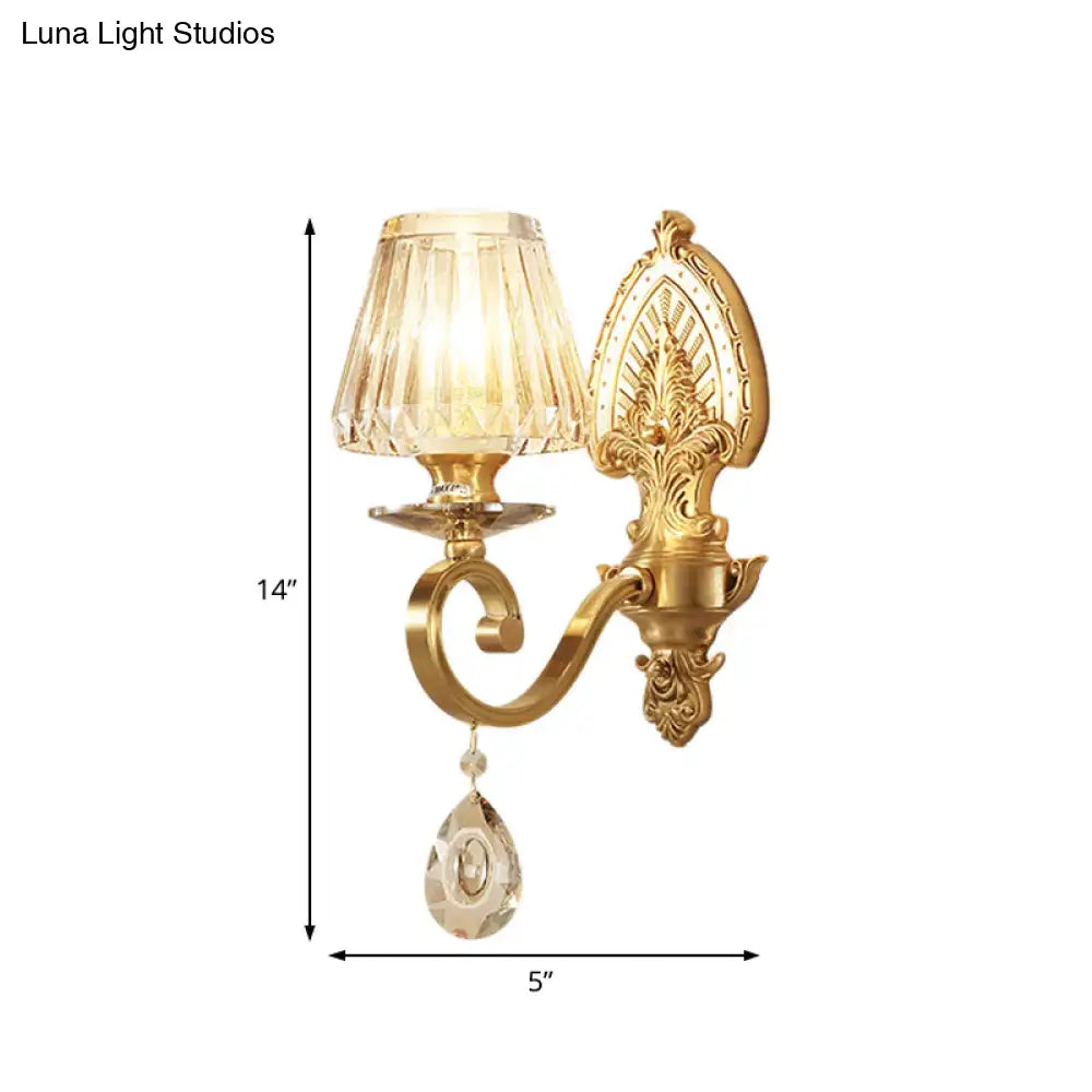 Mid century gold crystal wall sconce with faceted crystal shade and teardrop pendant compatible with led incandescent light types
