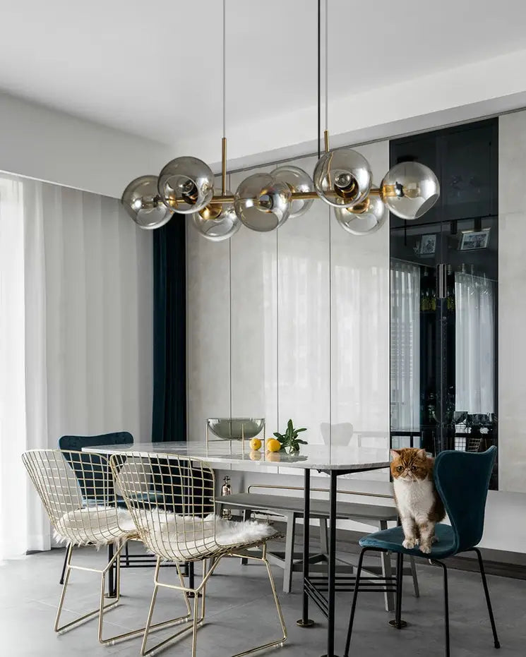 Modern glass globe pendant light with gold metal accents in a mid-century smoked glass chandelier for dining room led light 110v-120v 220v-240v