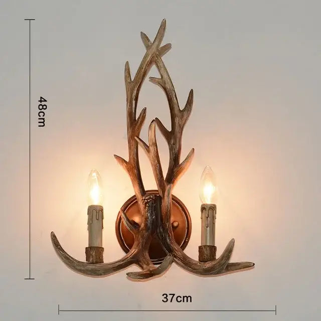 Mid century modern golden antler chandelier with two candle bulbs in rustic brown resin by decorbites antler chandelier