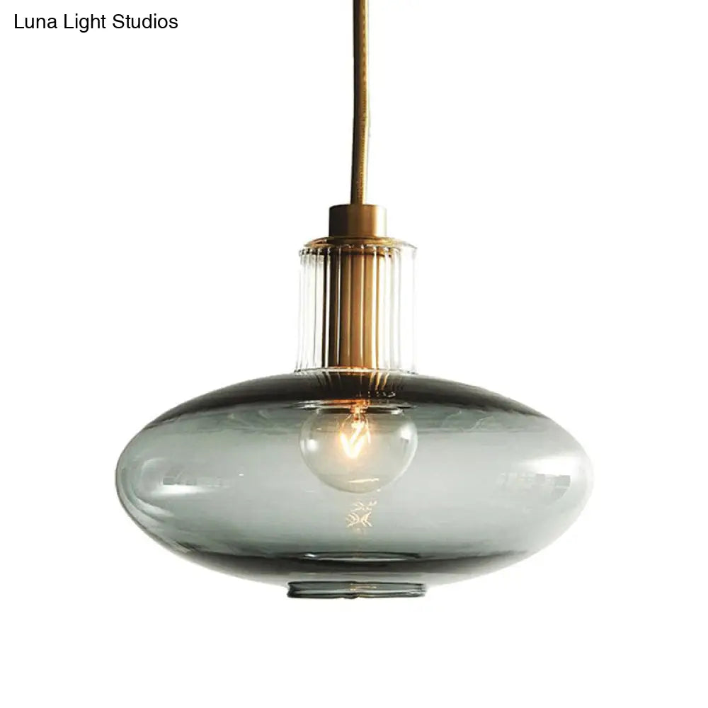 Lámpara colgante ovalada de cristal azul de mediados de siglo con corcho de latón para comedor