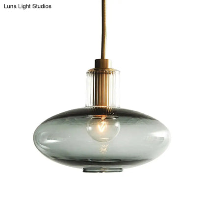 Lámpara colgante ovalada de cristal azul de mediados de siglo con corcho de latón para comedor