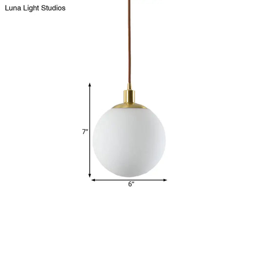 Milky Glass Ball Pendant Light: Modern LED Ceiling Lamp in Brass (6"/8"/10" Wide)