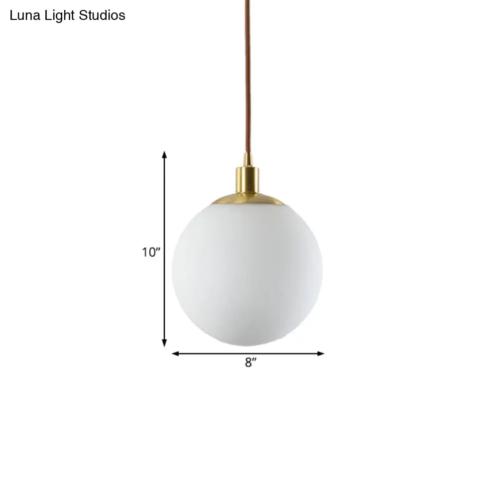 Milky Glass Ball Pendant Light: Modern LED Ceiling Lamp in Brass (6"/8"/10" Wide)