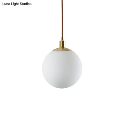 Milky Glass Ball Pendant Light: Modern LED Ceiling Lamp in Brass (6"/8"/10" Wide)