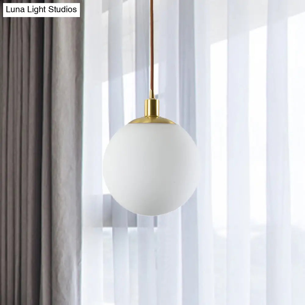 Milky Glass Ball Pendant Light: Modern LED Ceiling Lamp in Brass (6"/8"/10" Wide)