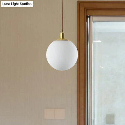 Milky Glass Ball Pendant Light: Modern LED Ceiling Lamp in Brass (6"/8"/10" Wide)