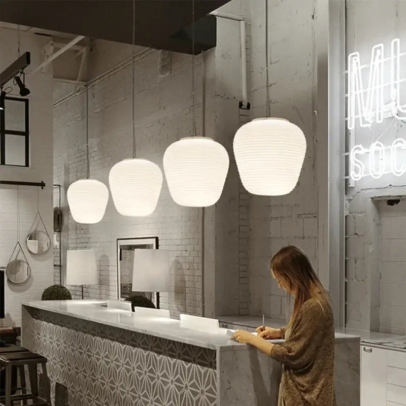 Milky white glass whorls cocoon pendant light with white ribbed paper lantern design for dining room ceiling