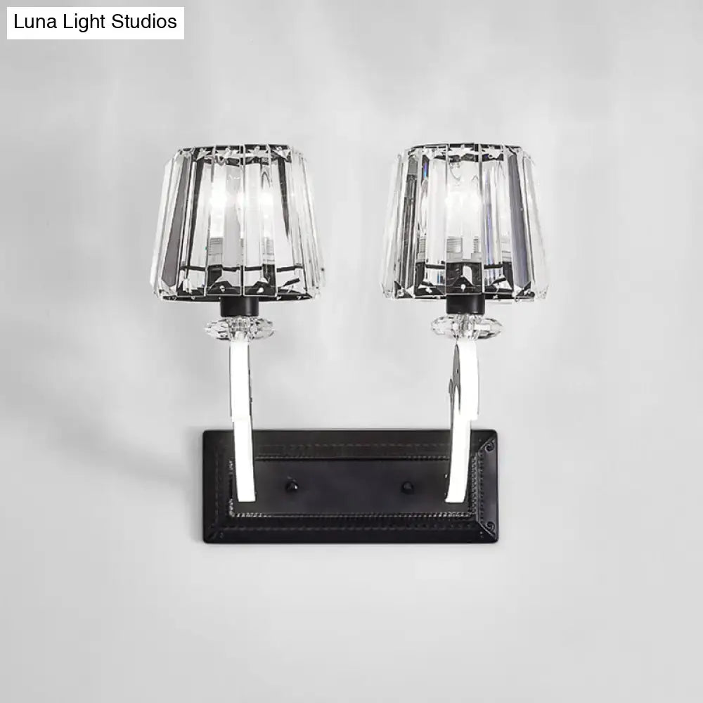 Minimal brass and crystal wall lamp with cone shade featuring elegant crystal sconce and black metal base for bedroom