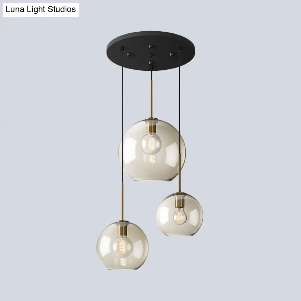 Minimalist 3-Light Pendant with Amber Glass Shade and Black Finish