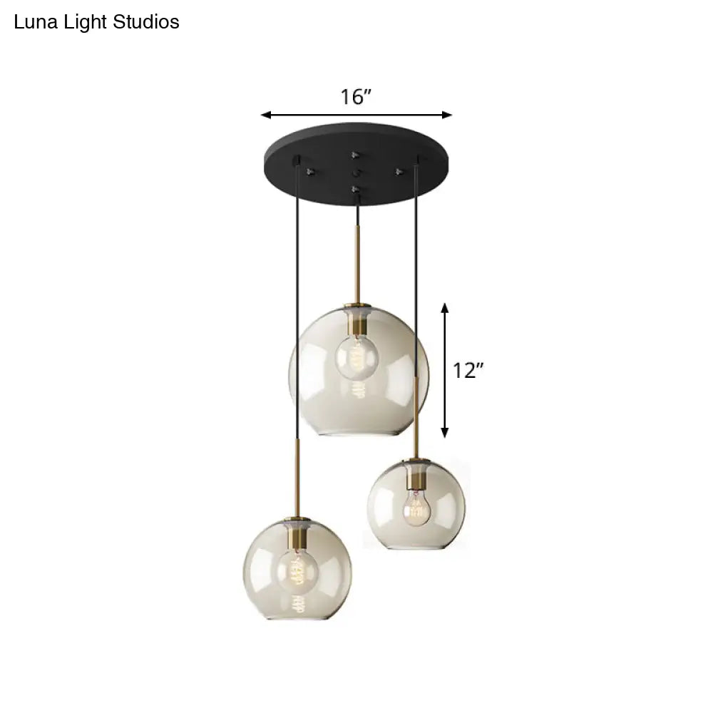 Minimalist 3-Light Pendant with Amber Glass Shade and Black Finish