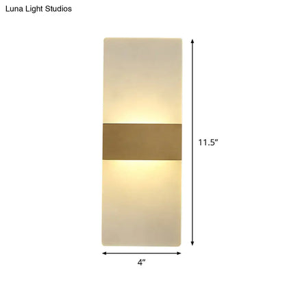 Modern minimalist acrylic gold wall sconce with frosted glass panels and warm glow for bedroom wall lamp lighting