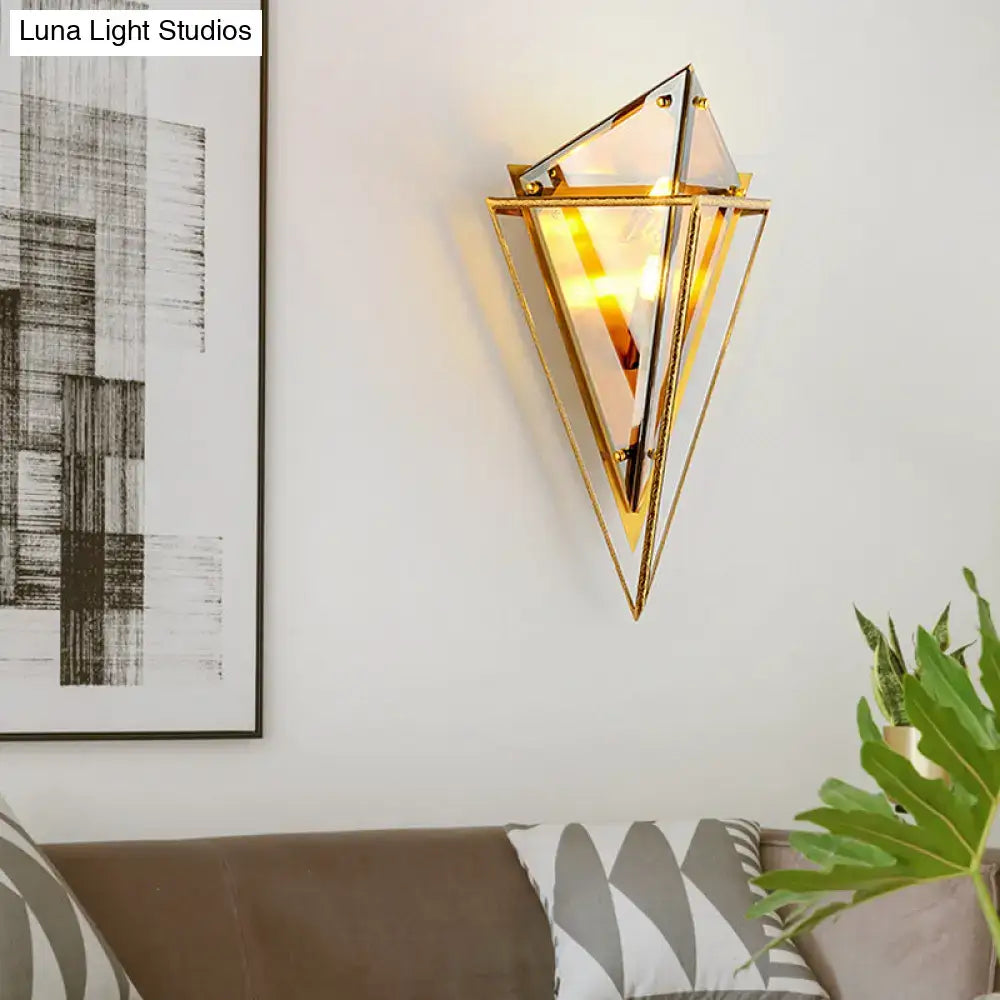 Gold-framed minimalist wall light with amber and smoke gray triangular glass panels geometric diamond wall light