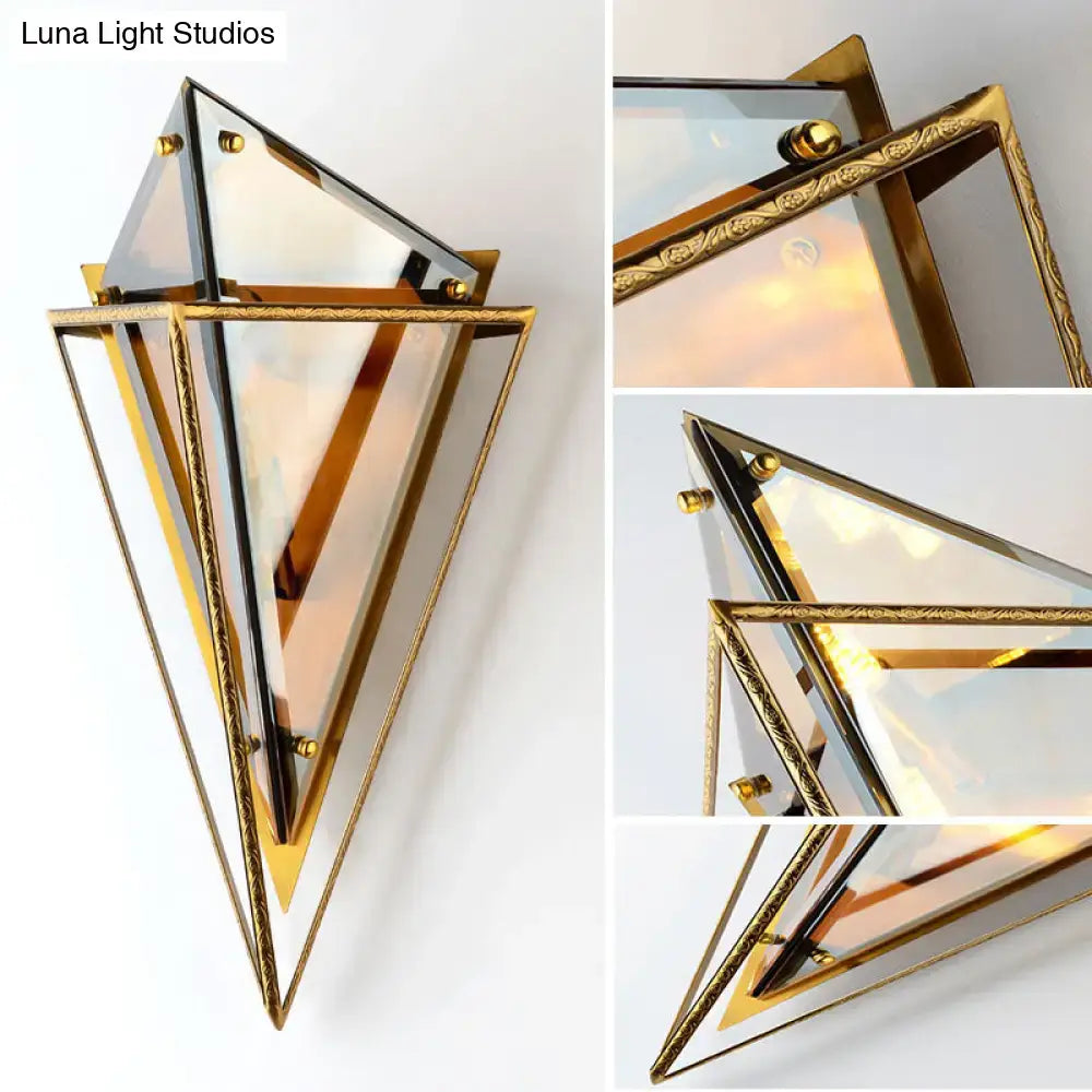 Gold-toned minimalist diamond wall light with etched glass panels smoke gray accents for living room sconce