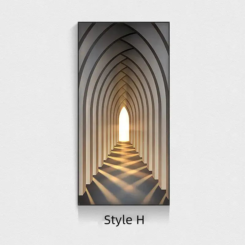 A modern black-framed canvas print with warm golden light complements a minimalist beige abstract led wall lamp hallway art