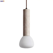 Minimalist beige concrete cylinder pendant light with smooth white glass bulb from decorbites glass stone led collection