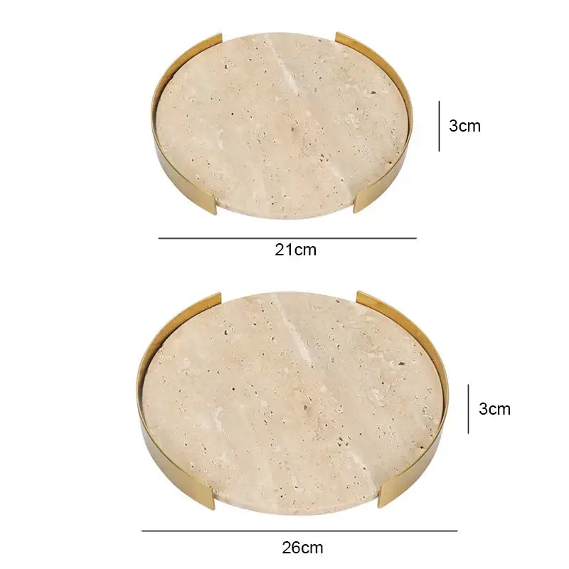 Two oval serving trays with beige brown travertine marble surfaces and gold metal frames for minimalist dining room decorbites decor