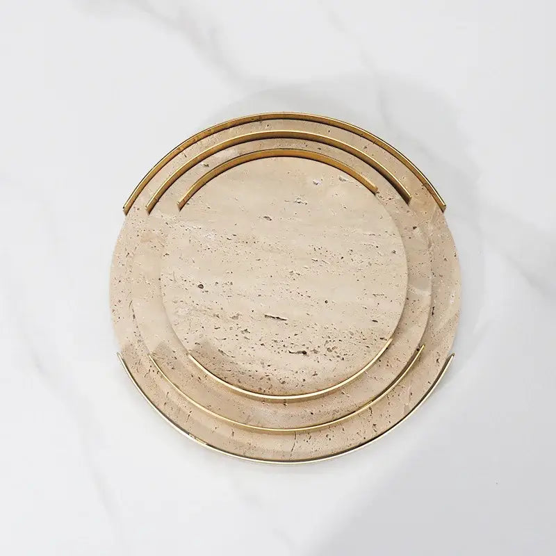 Minimalist beige brown travertine marble tray with concentric gold-toned rings for dining room decorbites beige brown decor
