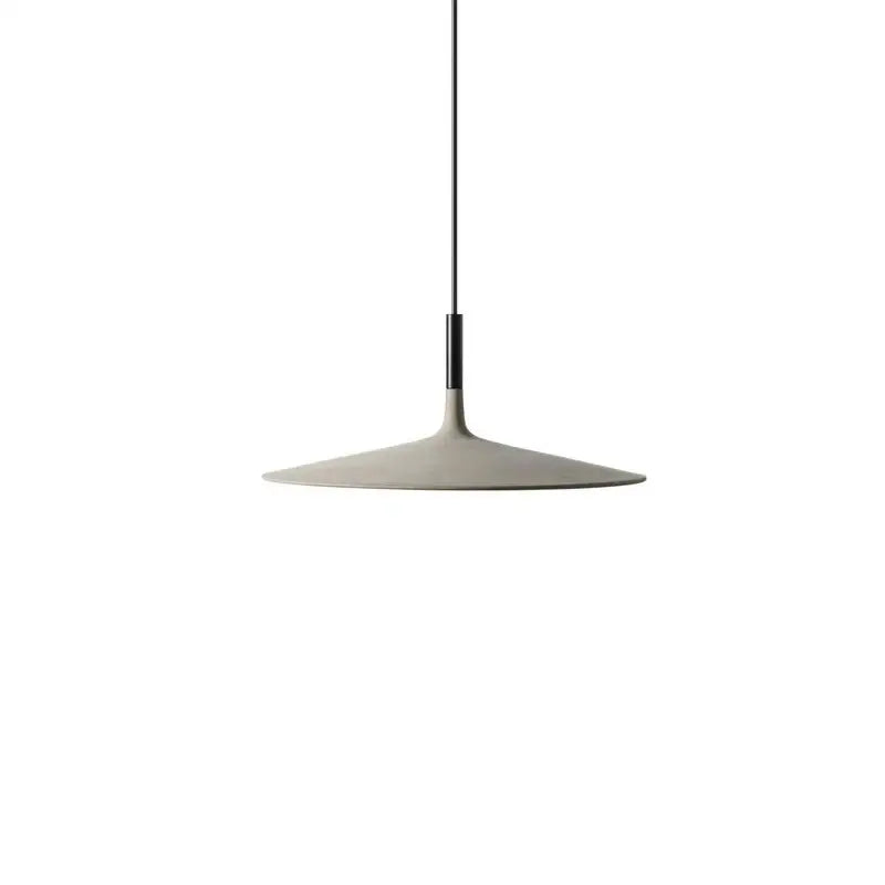 Minimalist beige decorbites cement ufo led pendant light with off-white ceramic disc shade and black suspension rod for dining room