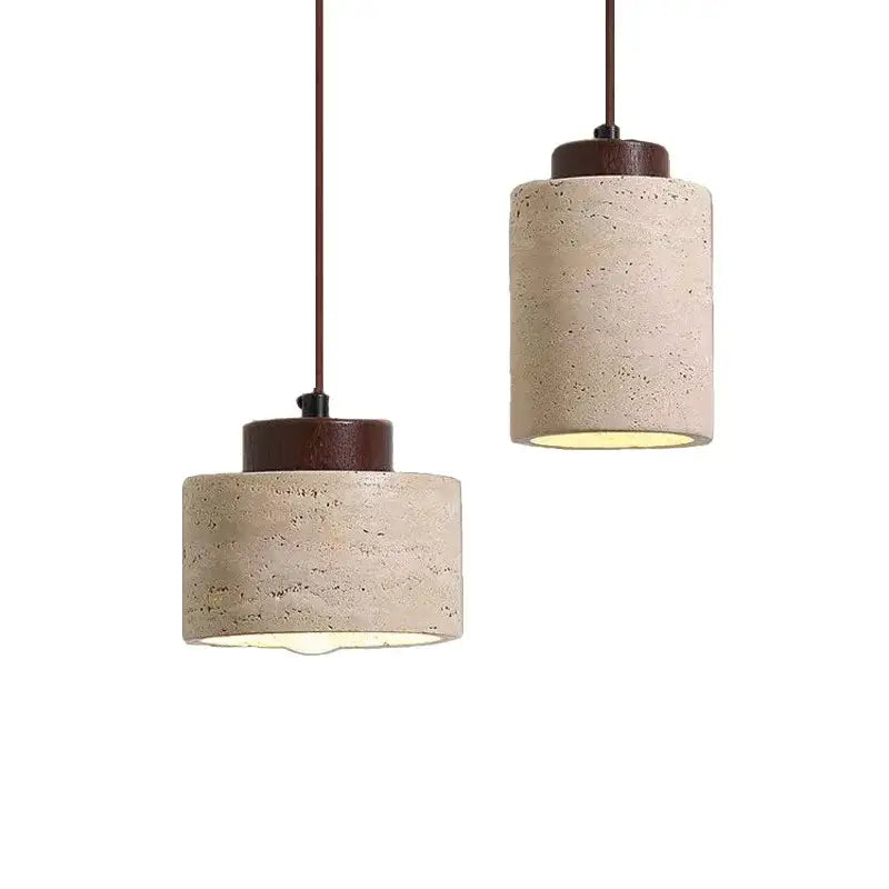 Minimalist beige stone shade pendant light with dark wood accents and warm illumination for kitchen dining room ceiling tray