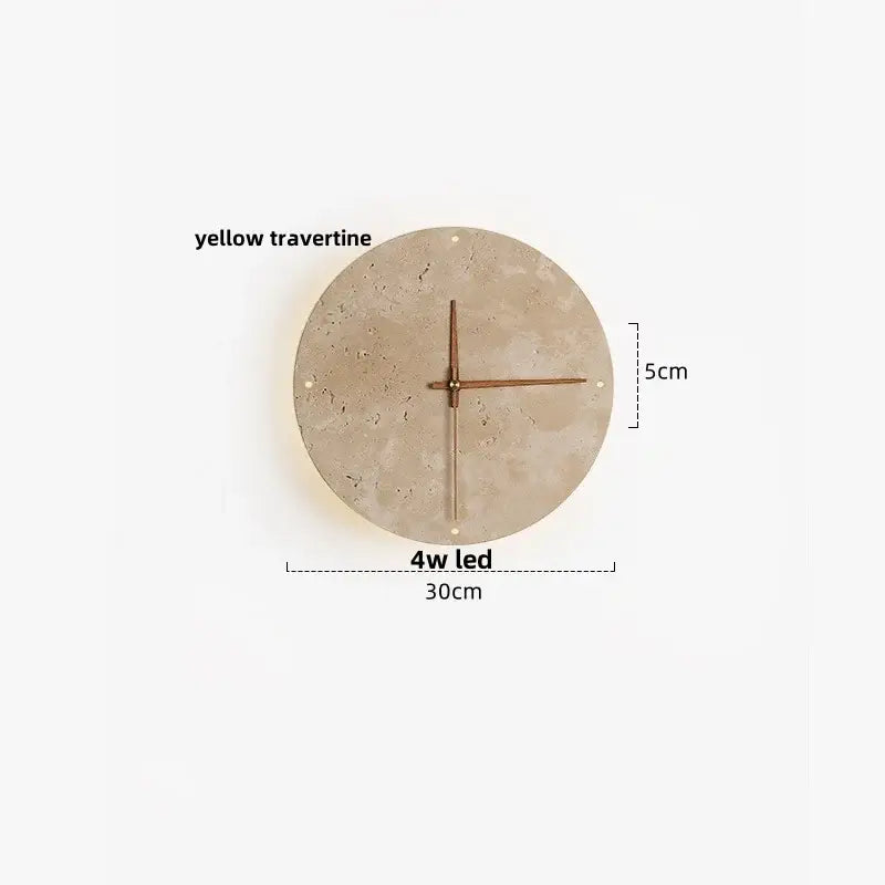A minimalist beige travertine wall clock with yellow face and bronze hands complements led wall lights for bedroom decor