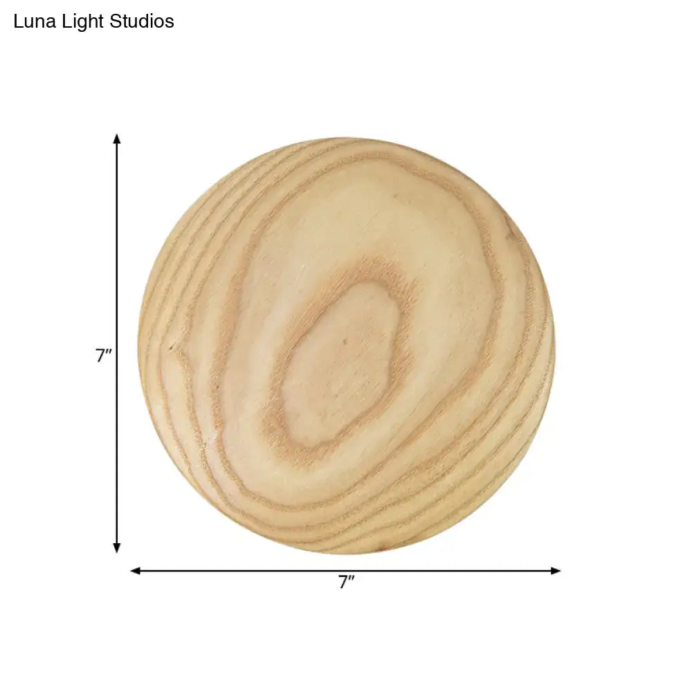 Minimalist beige wood circle led bulb wall sconce featuring a 7-inch natural light brown wooden sphere with wood grain