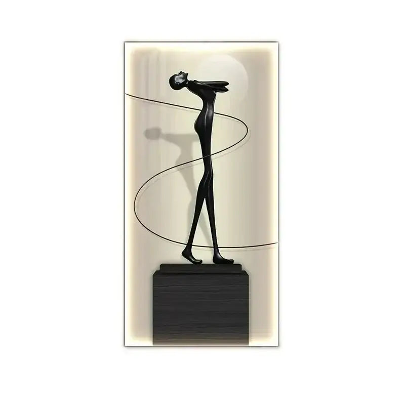 Minimalist black abstract figure luminous wall lamp with elongated limbs on a dark base for living room decor