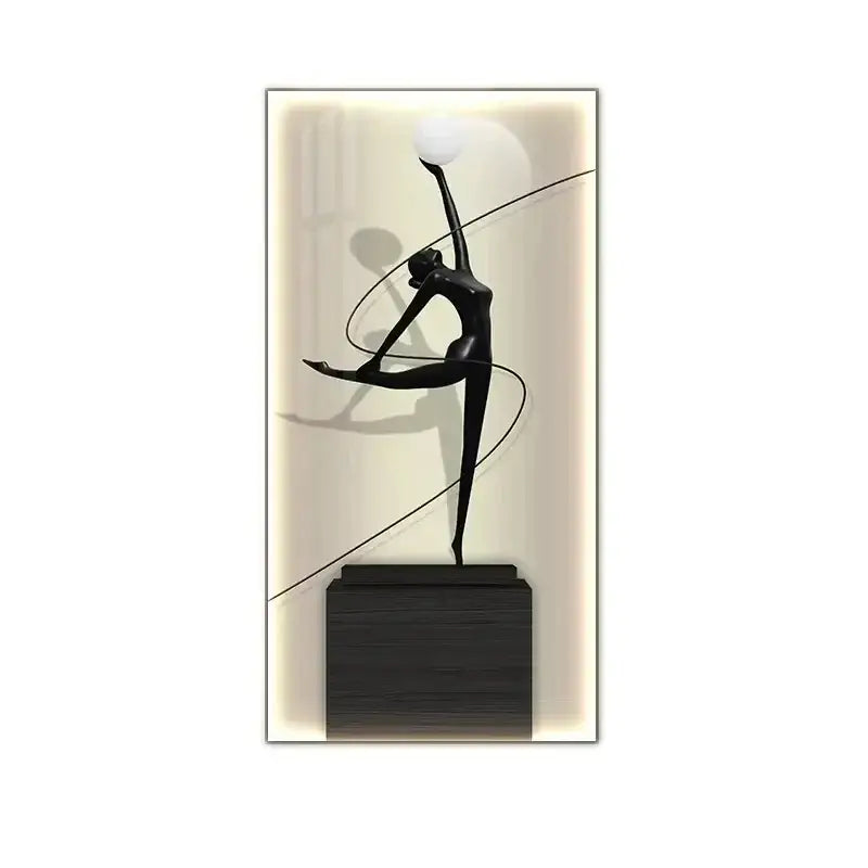 Minimalist black abstract figure luminous wall lamp with glossy dancer figurine holding white sphere on wooden base