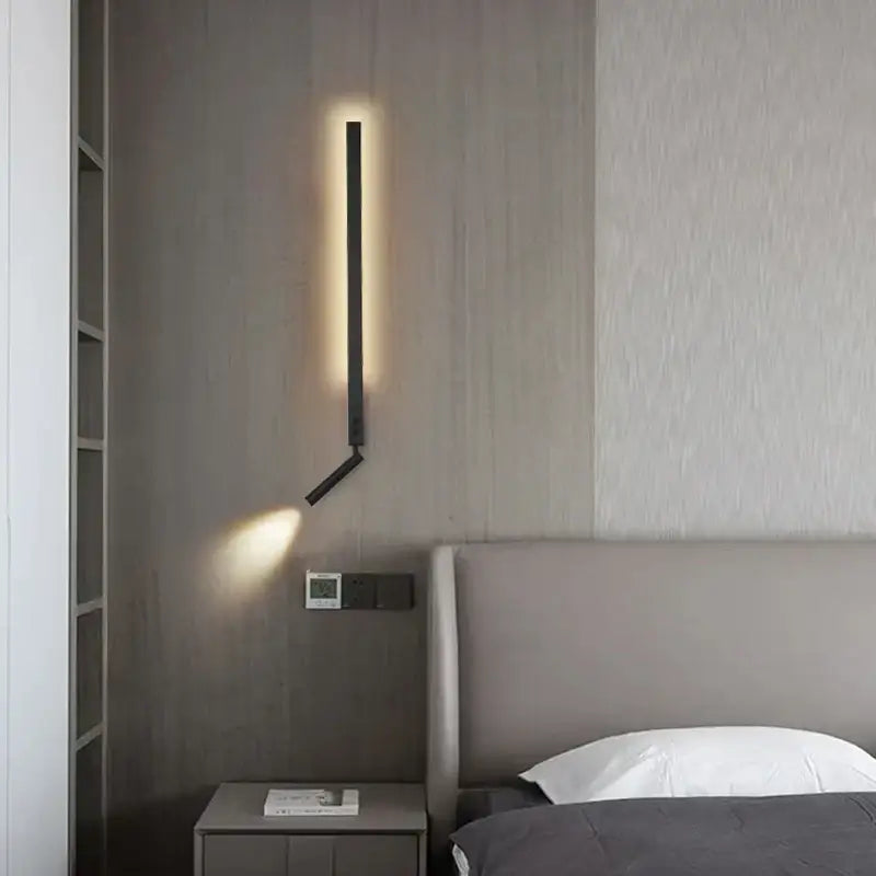 Minimalist black wall lamp with sleek elongated design and decorbites adjustable angle arm for bedroom reading sconce