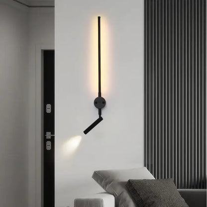 Minimalist black wall lamp with adjustable angle arm and sleek vertical bar emitting warm light by decorbites adjustable angle