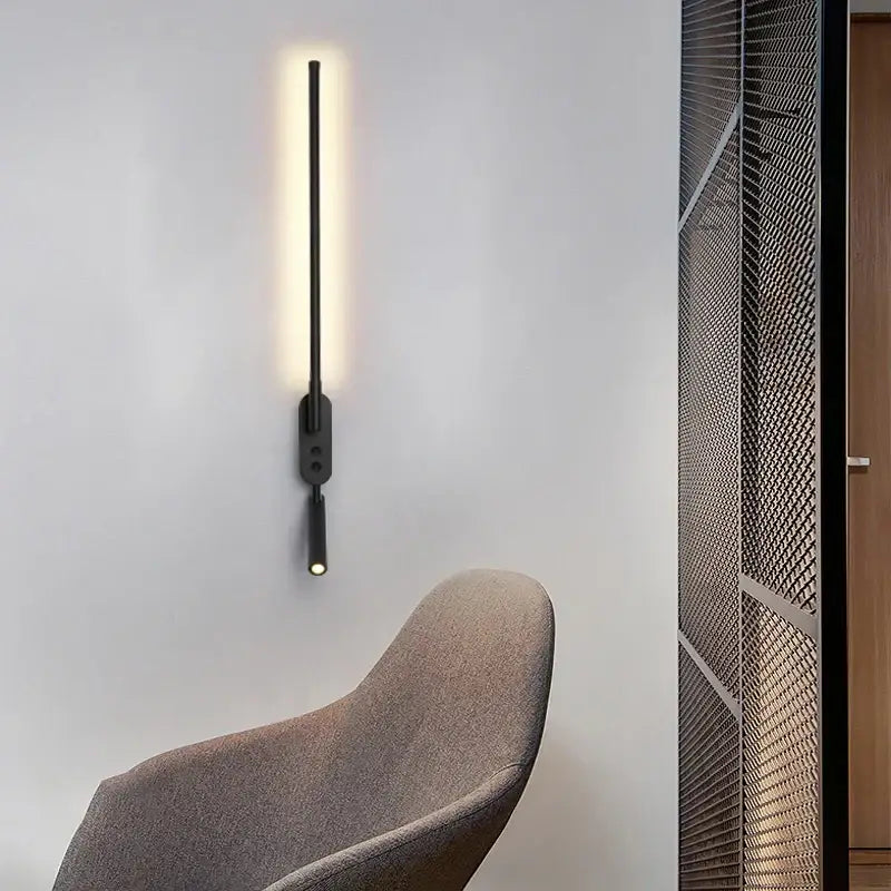 Minimalist black adjustable angle wall lamp with sleek vertical design and warm led lighting for bedroom reading decorbites adjustable angle