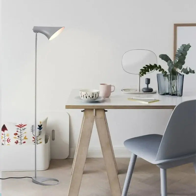 Modern gray floor lamp with a sleek metallic finish and minimalist design in decorbites adjustable led floor lamp style