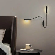 Minimalist black decorbites adjustable vintage wall lamp with articulated arm and warm light for bedroom reading