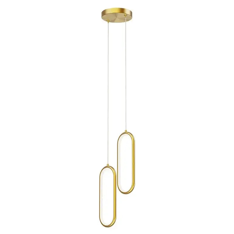 Modern gold-finished aluminium led chandelier with two elongated oval lights suspended by thin cords for dining room use