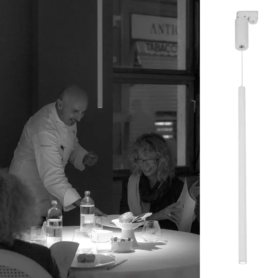 White cylindrical pendant light with minimalist design and small bracket in black aluminum led ceiling rail track spotlights
